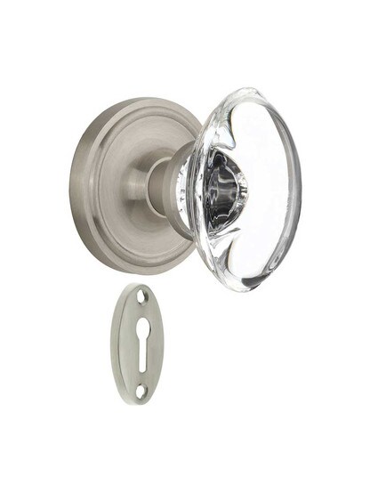 Classic Rosette Mortise-Lock Set with Oval Crystal Glass Knobs in Satin Nickel.